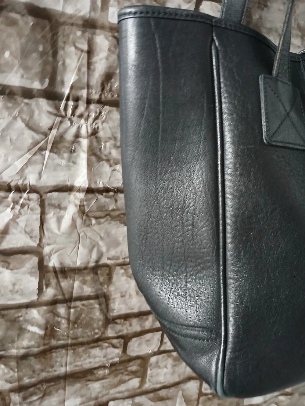 Dooney & Bourke Black Leather Tote with Gold Charm